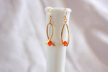 Load image into Gallery viewer, Ribbon twist earrings - gold with orange crystals