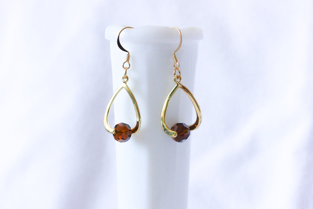 Curvy earrings - gold with topaz brown