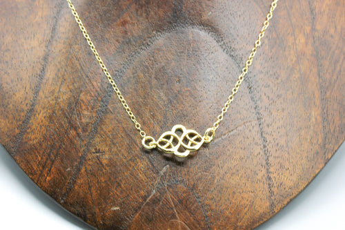 Celtic knot style 18k gold necklace