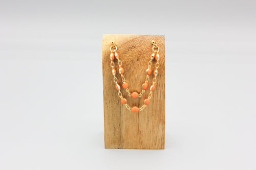 Double piercing chain earrings - gold/coral