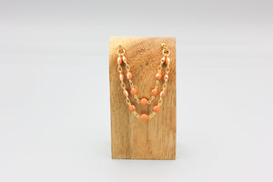 Double piercing chain earrings - gold/coral