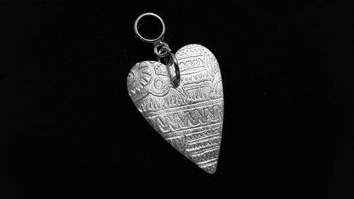 Tattooed on my heart .999 fine silver pendant