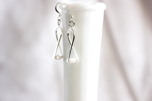'A little bent' earrings - silver with ivory pearl