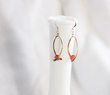 Load image into Gallery viewer, Ribbon twist earrings - gold with red crystals