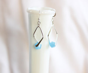 Twisted angle earrings - silver with sky blue crystals