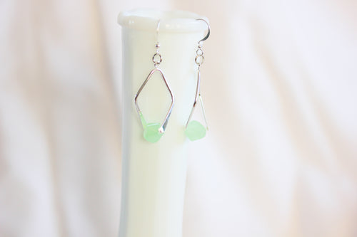 Twisted angle earrings - silver with green crystals