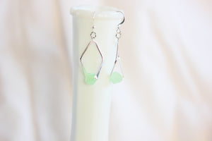 Twisted angle earrings - silver with green crystals